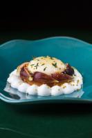 a dessert on a blue plate on a table at Hôtel Le Café de Paris in Biarritz