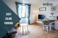 a living room with a table and a dining room at ONLOC - St Exupéry -Magnifique appart au calme avec chambre - parking in Pau