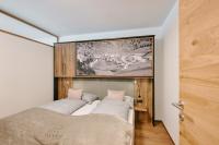 A bed or beds in a room at 1400 FlexenLodge