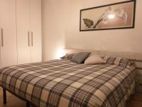 A bed or beds in a room at Casa di Gabry