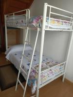 Postel nebo postele na pokoji v ubytování Viviendas vacacionales La Casona de Tresniñin