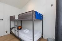 Postel nebo postele na pokoji v ubytování Welcome in - Lepelblad 7, Nieuwvliet