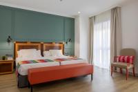 Postel nebo postele na pokoji v ubytování Hotel Don Curro