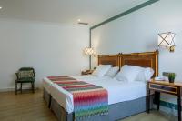 Postel nebo postele na pokoji v ubytování Hotel Don Curro