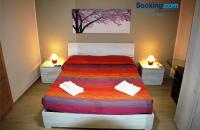 A bed or beds in a room at Da Aloisia - Casa Vacanze