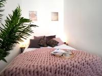 Posteľ alebo postele v izbe v ubytovaní Apartament Litevski Deluxe