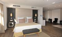 Postel nebo postele na pokoji v ubytování Hotel Salobreña Suites