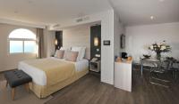 Postel nebo postele na pokoji v ubytování Hotel Salobreña Suites