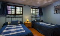 Cama o camas de una habitación en Casas Rurales Carroyosa del Jerte