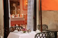 Reštaurácia alebo iné gastronomické zariadenie v ubytovaní Hotel Canaletto