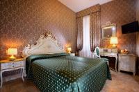 Posteľ alebo postele v izbe v ubytovaní Hotel Canaletto