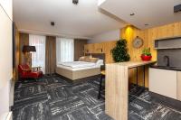 Postel nebo postele na pokoji v ubytování Apartmány U Vinice