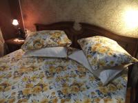 A bed or beds in a room at The Pearl Apartment Varna