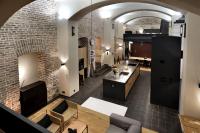 Posezení v ubytování American Loft in the Heart of Prague
