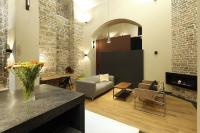 Posezení v ubytování American Loft in the Heart of Prague