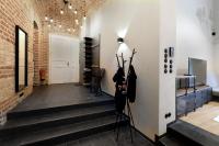 Posezení v ubytování American Loft in the Heart of Prague