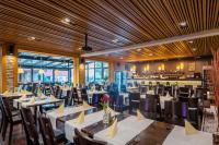 Reštaurácia alebo iné gastronomické zariadenie v ubytovaní Via Jasna Wellness Apartments