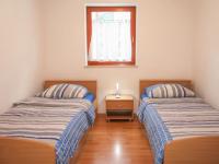 Posteľ alebo postele v izbe v ubytovaní Apartment Branka by Interhome