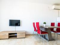 Televízia a/alebo spoločenská miestnosť v ubytovaní Apartment Villa 2 Pools-3 by Interhome
