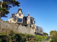 a castle on the top of a wall at Studio La Garde by Interhome in Dinard