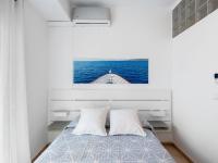 Postel nebo postele na pokoji v ubytování Apartment Benasol-1 by Interhome