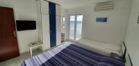 Postel nebo postele na pokoji v ubytování 205 Mata, 80m vom Strand