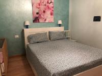 Posteľ alebo postele v izbe v ubytovaní Casa Teodoro - Gelsomino, Ulivi & Orchidea