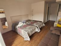 A bed or beds in a room at Beautiful Studio in Minerva
