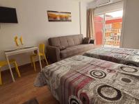 A bed or beds in a room at Beautiful Studio in Minerva