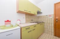 Kuchyňa alebo kuchynka v ubytovaní Apartmani Češljar