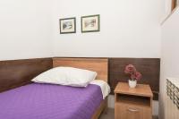 Posteľ alebo postele v izbe v ubytovaní Apartmani Češljar
