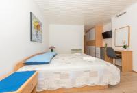 Posteľ alebo postele v izbe v ubytovaní Apartmani Češljar