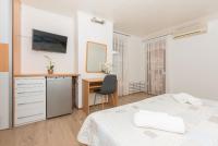 Posteľ alebo postele v izbe v ubytovaní Apartmani Češljar