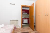 Posteľ alebo postele v izbe v ubytovaní Apartmani Češljar