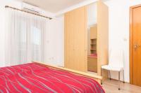 Posteľ alebo postele v izbe v ubytovaní Apartmani Češljar