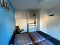 Postel nebo postele na pokoji v ubytování Zoutelande vakantiewoning
