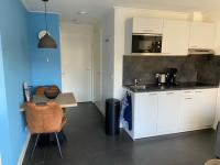 Kuchyň nebo kuchyňský kout v ubytování Zoutelande vakantiewoning