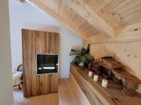 Telewizja i/lub zestaw kina domowego w obiekcie Ferienwohnung Anna Salzburg Grödig