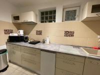 Kuchnia lub aneks kuchenny w obiekcie Corte Apartman