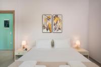Posteľ alebo postele v izbe v ubytovaní SEA BREEZE APARTMENTS
