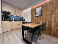 Kuchyň nebo kuchyňský kout v ubytování Apartmány Panorama Harrachov