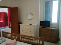 A television and/or entertainment centre at Finestrelle Pied à terre a Otranto