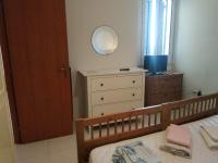 A bed or beds in a room at Finestrelle Pied à terre a Otranto
