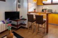 A kitchen or kitchenette at Apartamentos Top Medieval