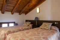 A bed or beds in a room at Apartamentos Top Medieval