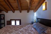 A bed or beds in a room at Apartamentos Top Medieval
