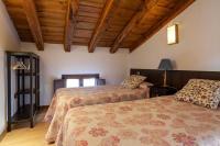 A bed or beds in a room at Apartamentos Top Medieval