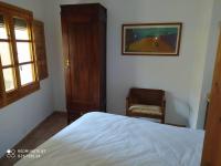 A bed or beds in a room at casa sobre rio Noguera Pallaresa