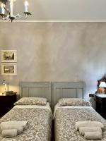 Posteľ alebo postele v izbe v ubytovaní Giulia apartment and room