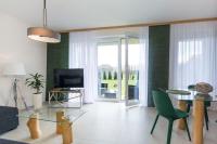 Televízia a/alebo spoločenská miestnosť v ubytovaní Apartament Zen